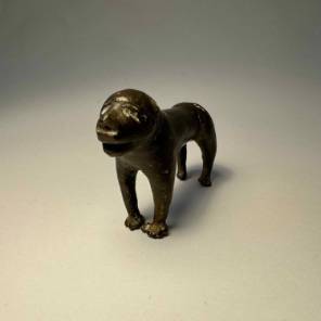 A Small French Bronze Dog